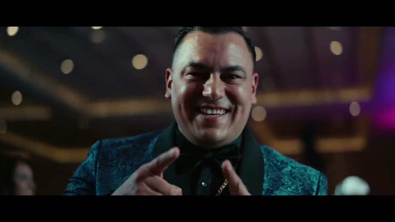 A smiling guest in The Builders Cup recap film